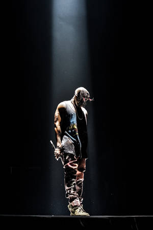 Solemn Spotlight Kanye West Android Wallpaper