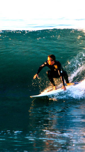 Surfing Guy About To Stand Wallpaper