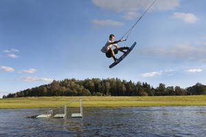 Wakeboarding Mid-air Melon Grab Trick Wallpaper