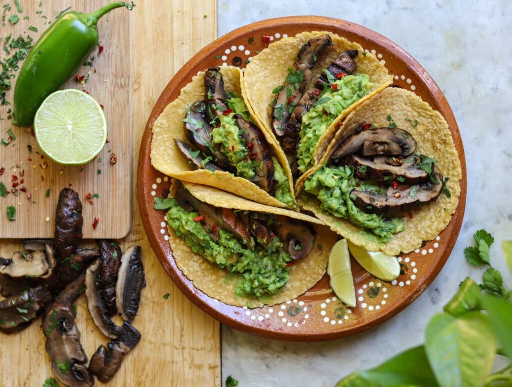 vegan mushroom taco recipe on a mexican plate.