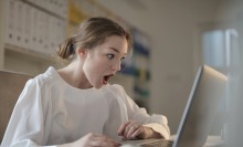 Girl staring at laptop