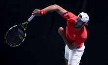 Britain's Jacob Fearnley serves against France's Arthur Cazaux