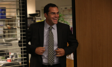 David Wallace, Dunder Mifflin's CFO, walking into the conference room