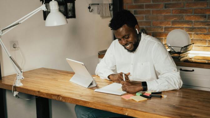 Man learning from tablet