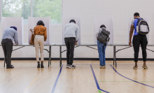 People voting at a polling booth