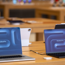 Two MacBook Pro laptops in the Apple store on Kurfürstendamm