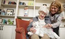 A woman and her caretaker bond with a robotic pet.