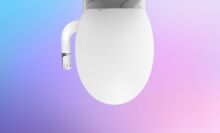 Slim Twist Bidet Attachment on a colorful background.