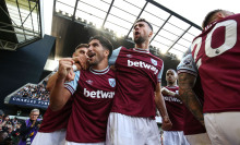 Carlos Soler and Max Kilman of West Ham United celebrate