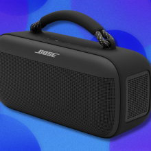 Bose SoundLink Max speaker on blue and purple abstract background