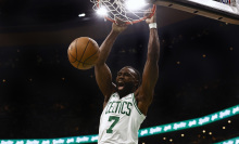 Jaylen Brown of the Boston Celtics dunks