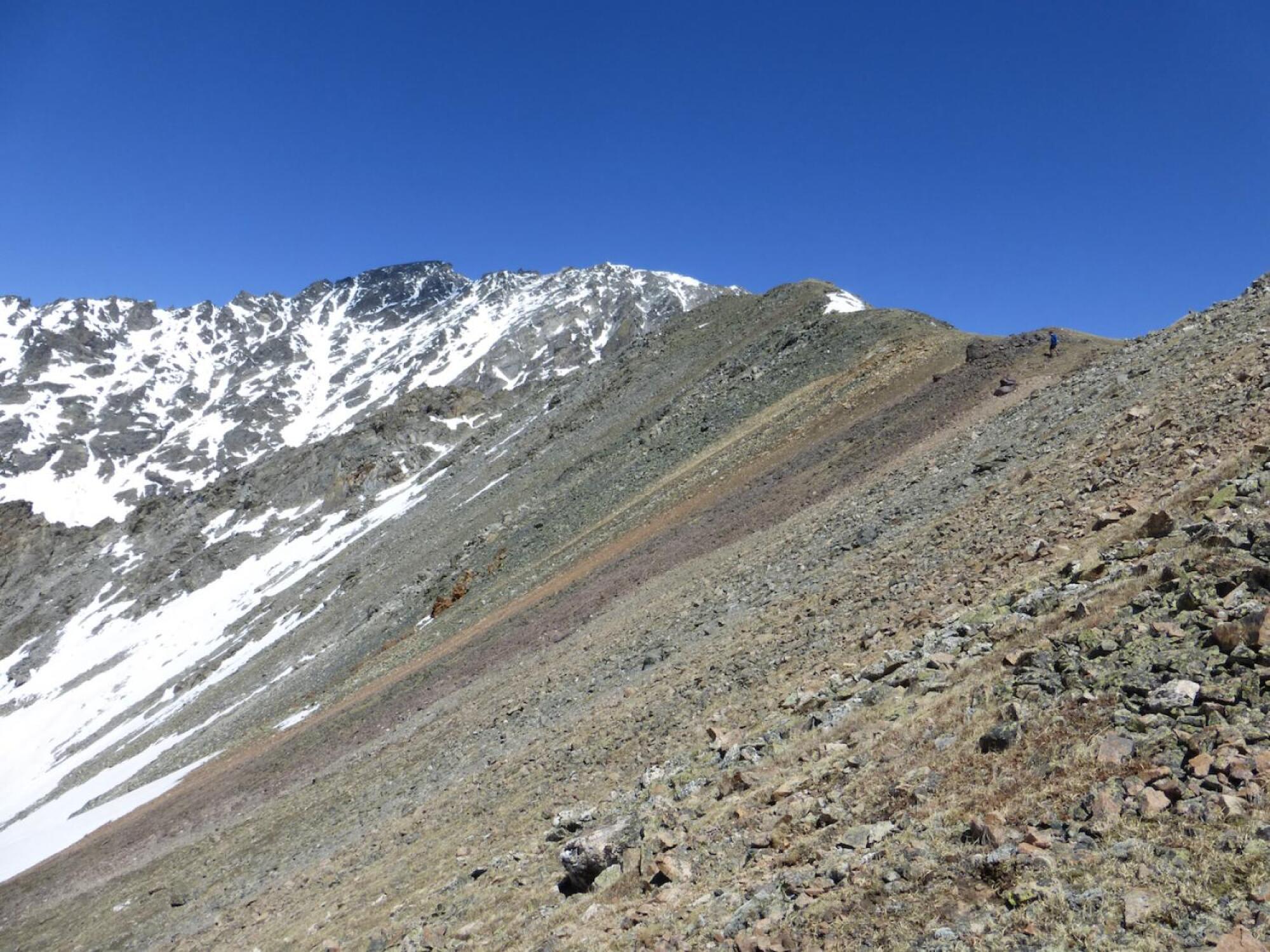 Orangish Tava sandstone exposed atop the Rocky Mountains.