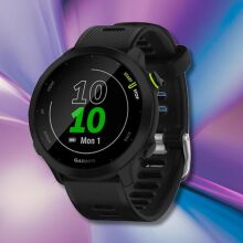 garmin forerunner 55 watch on a purple and blue background