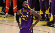  Los Angeles Lakers forward LeBron James (23) watches his dunk on replay screen during the Washington Wizards vs Los Angeles Lakers game on January 21, 2025, at Crypto.com Arena in Los Angeles, CA.