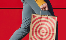 A person carrying a Target shopping bag