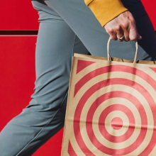 A person carrying a Target shopping bag