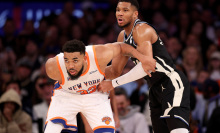 Karl-Anthony Towns #32 of the New York Knicks boxes out Giannis Antetokounmpo #34 of the Milwaukee Bucks during the second half at Madison Square Garden on January 12, 2025 in New York City. 