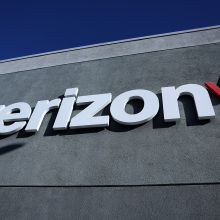 A sign is posted on the exterior of a Verizon store on September 30, 2024 in Daly City, California