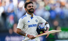 Virat Kohli of India celebrates scoring a century