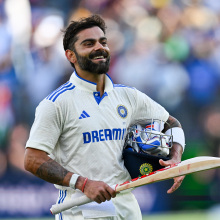 Virat Kohli of India celebrates scoring a century