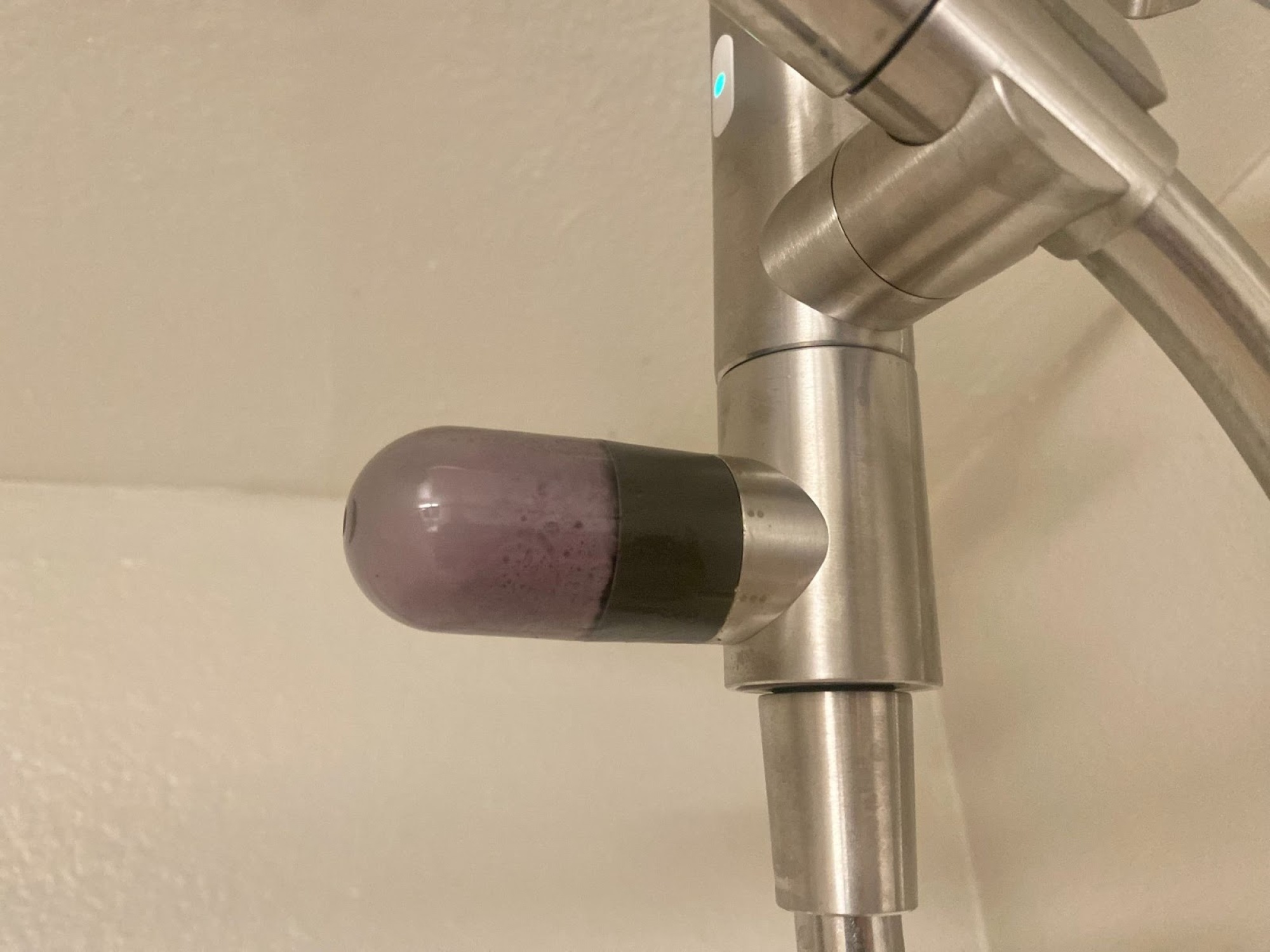 clear tube filled with purple infusion tablet