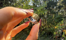 Person holding the Oura Ring 4