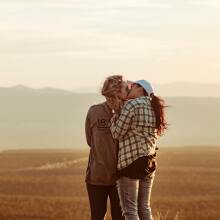 Two women kissing