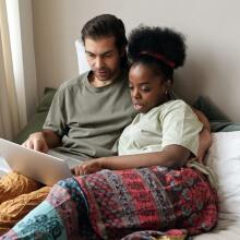 Couple watching laptop