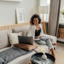 Woman looking at laptop