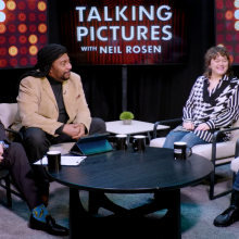 A screenshot of a critics' panel discussion from the TV show "Talking Pictures" 