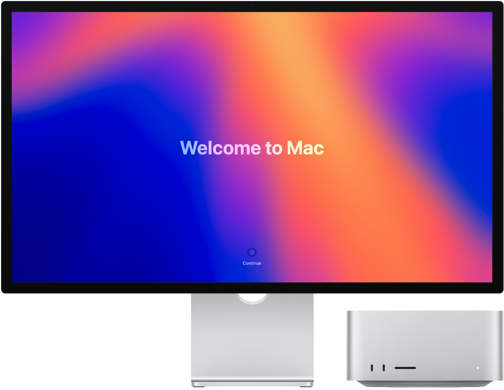 Un Studio Display et un Mac Studio côte à côte avec « Bienvenue sur le Mac » affiché à l’écran.