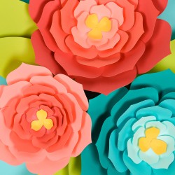 A close up of giant paper flowers