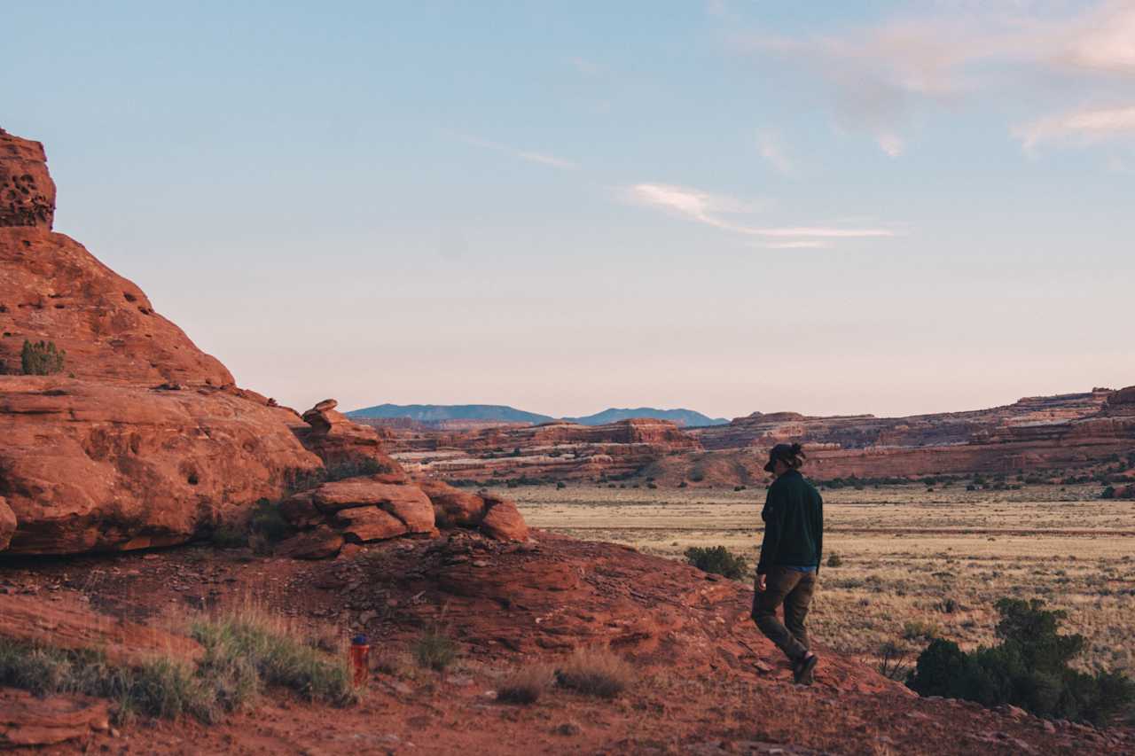 Venture beyond the campsite to find an excellent place to watch the sunset over the desert.