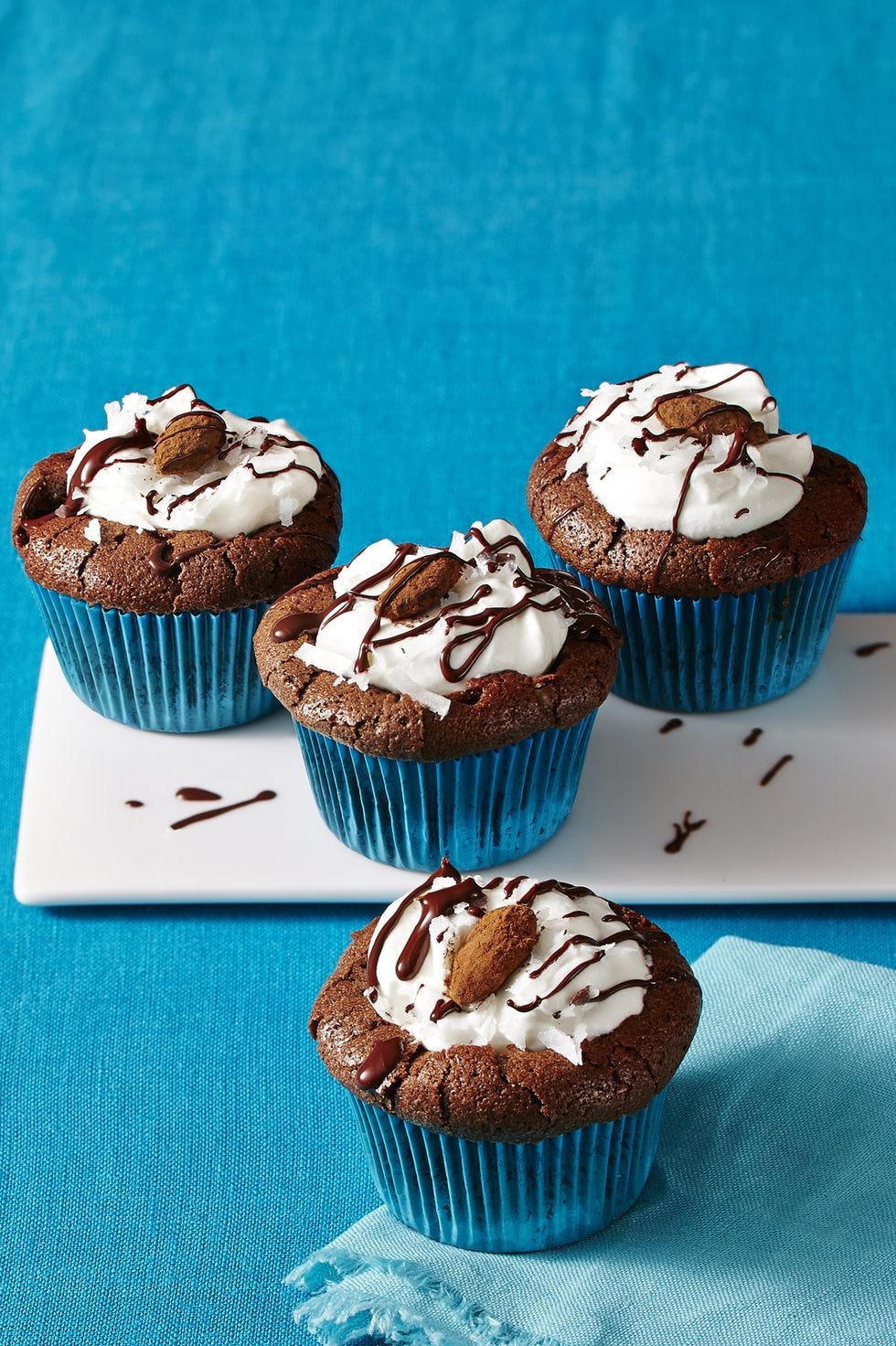 almond joy cupcakes against a blue background