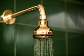 bathroom shower head and running water