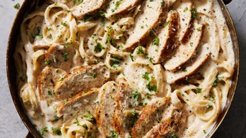 creamy alfredo with chicken breast and fresh parsley