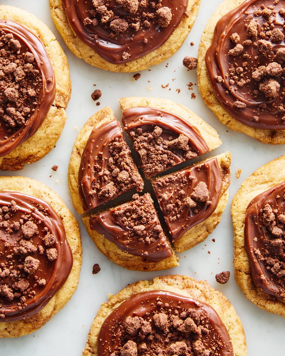 crumbl sugar cookie copycat topped with chocolate icing and chocolate pieces