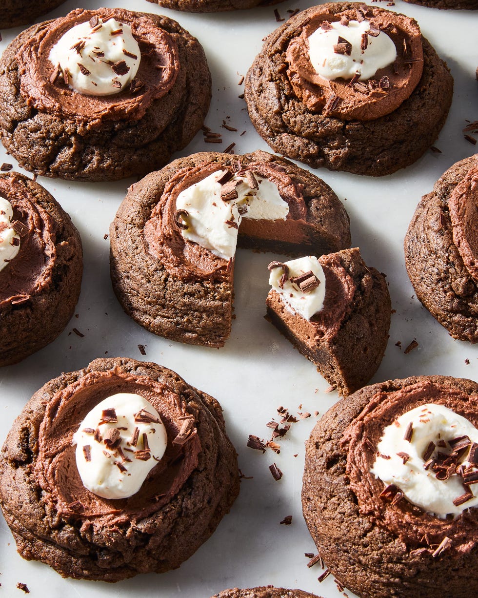 chocolate pie cookies topped with whipped cream and chocolate shavings