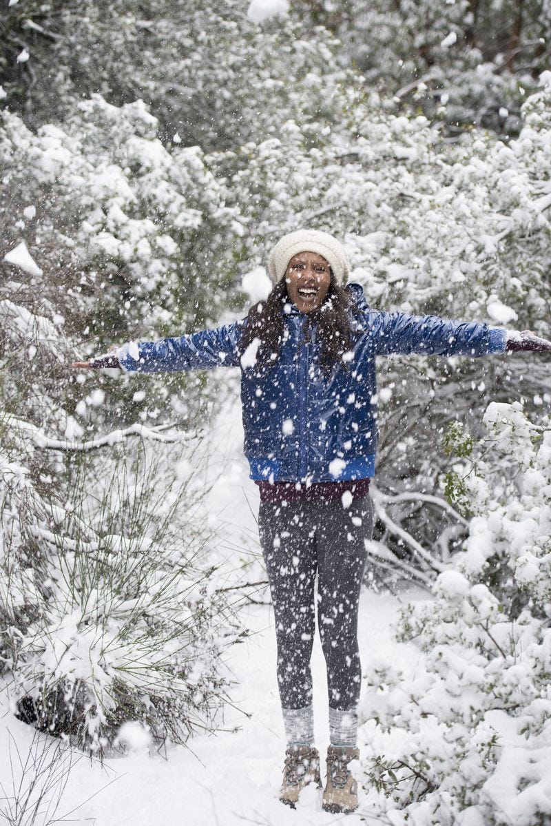 woman hiking in the snow