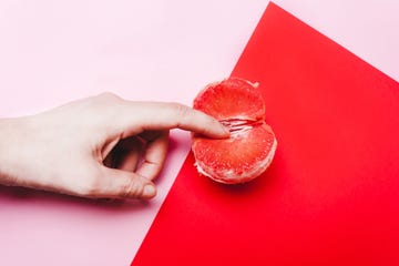 concept sex, masturbation hand, fingers in grapefruit