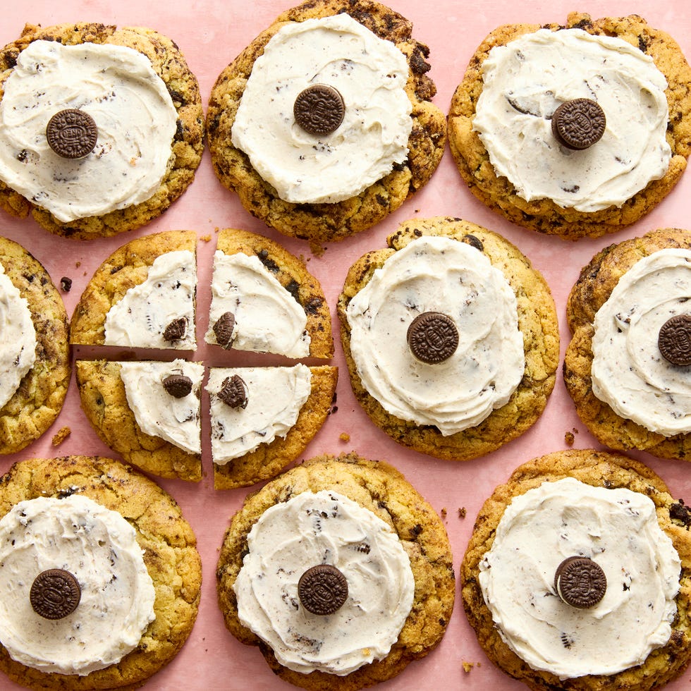 cookie topped with white icing and a mini oreo