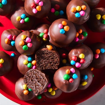 cosmic brownie protein bites on a red plate