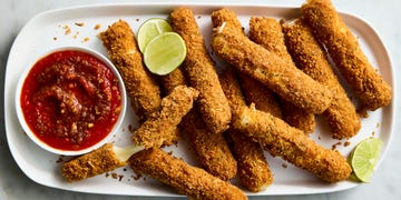 mozzarella sticks wrapped rice paper, then bread with parm and basil studded panko and fried until deep golden brown, ooey, gooey, and a little bit chewy