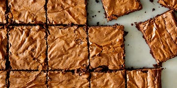 brownies in a grid on a marble surface