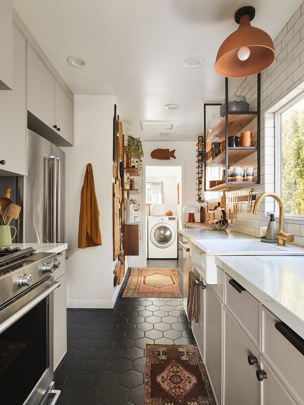 a kitchen with white cabinets