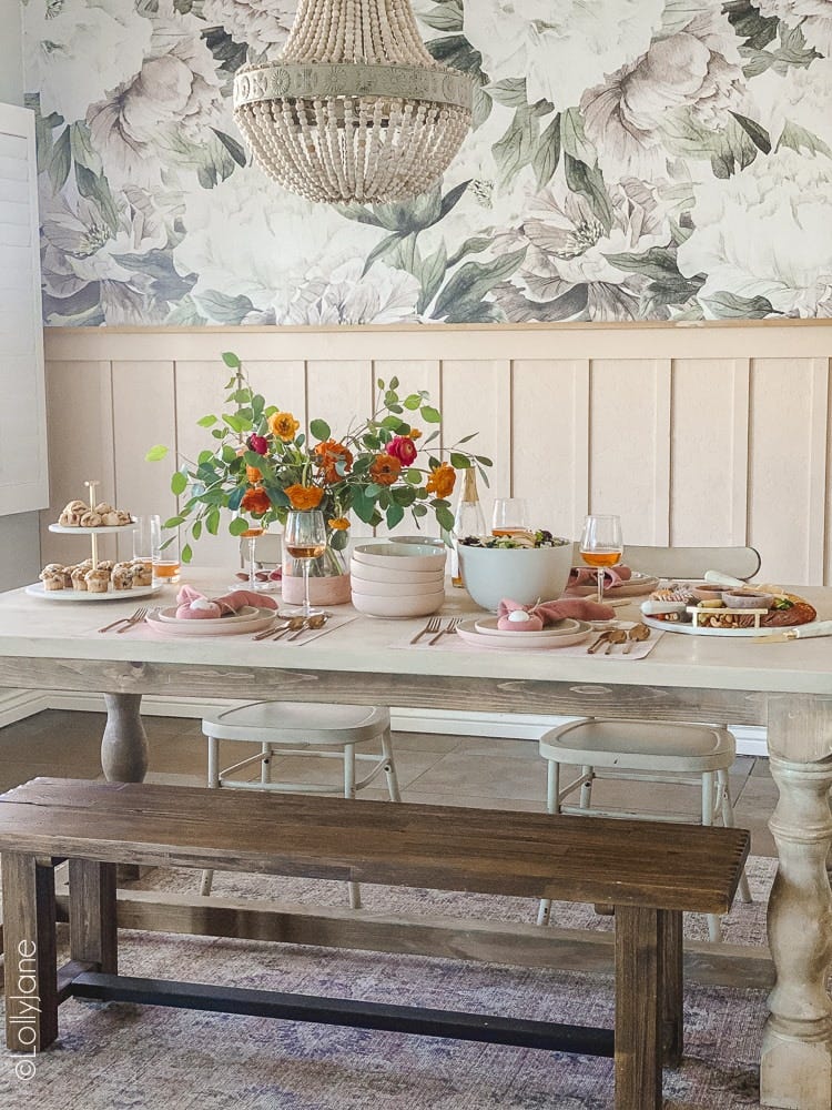 a table with food and flowers on it