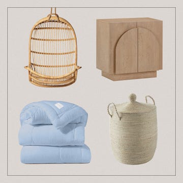 home decor items including a hanging chair a wooden cabinet a blue comforter and a woven storage basket