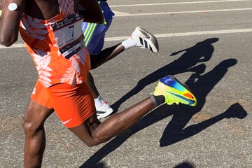 two runners in vibrant athletic wear participating in a race