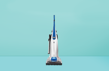 good housekeeping best vacuum for pet hair on blue background