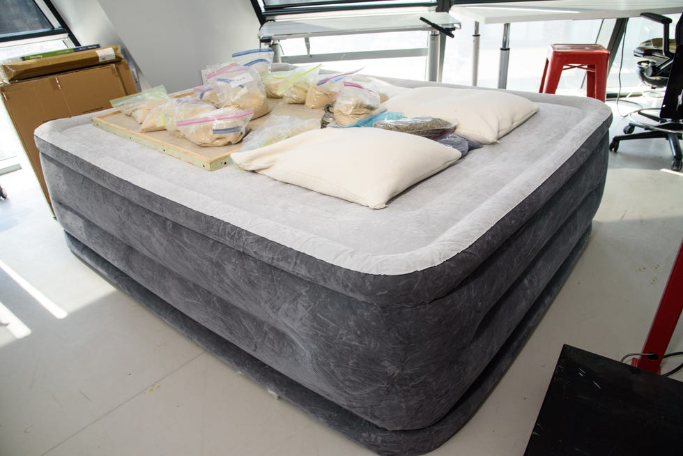 air mattress with weights placed on top